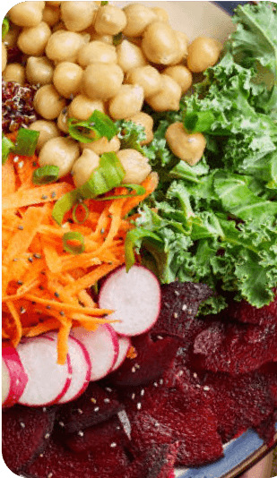 Salad with chickpeas, carrots, radishes, and beets.